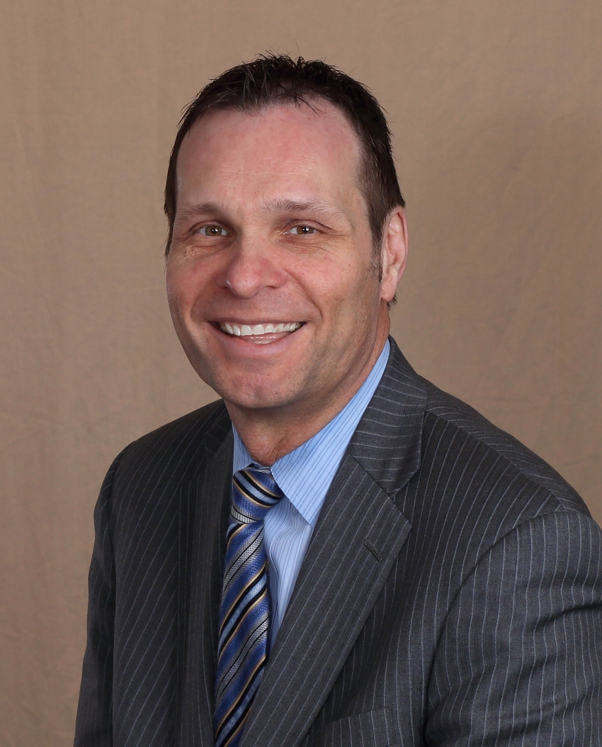Jim Shields in a grey suit